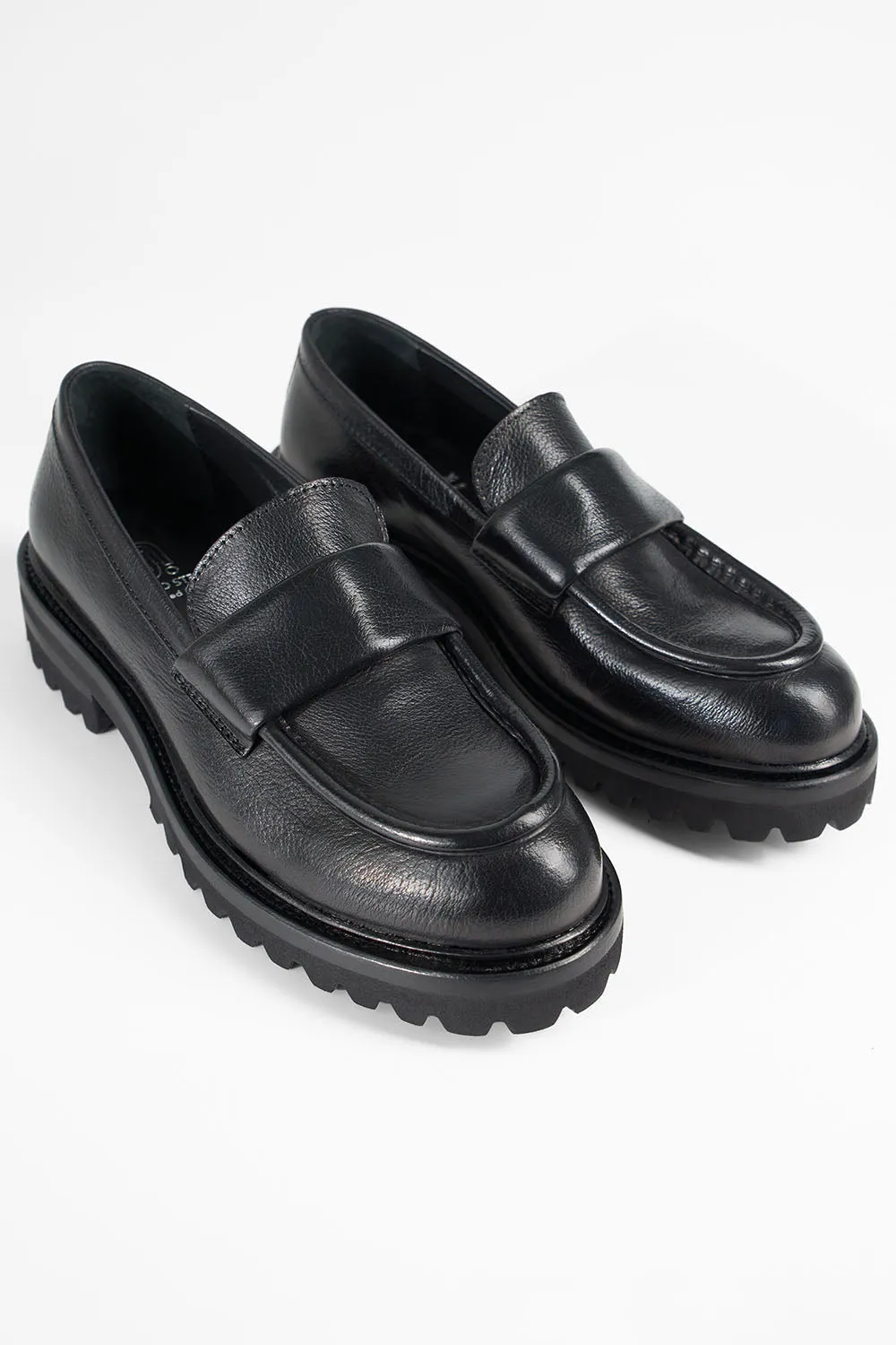 CAMDEN jet-black slip on shoes.