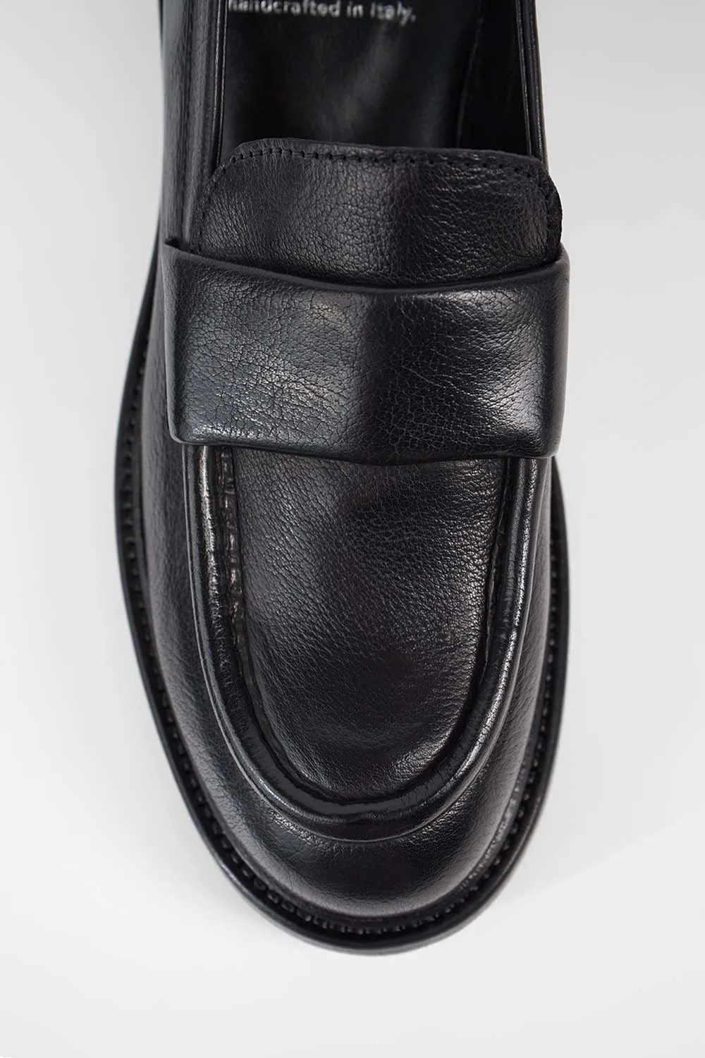 CAMDEN jet-black slip on shoes.