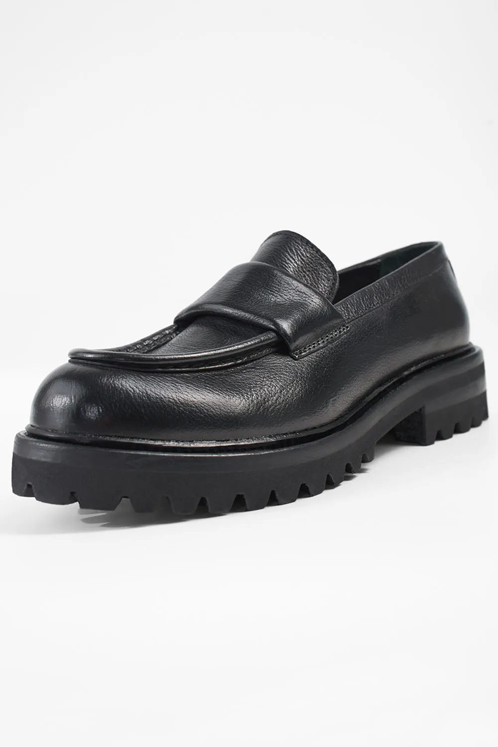 CAMDEN jet-black slip on shoes.