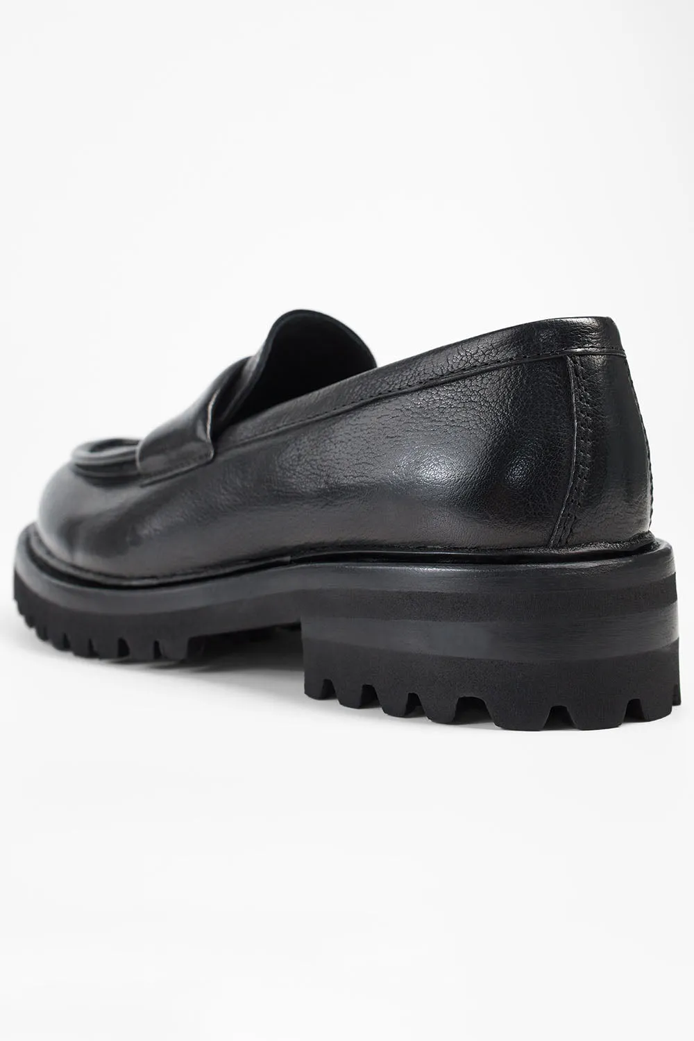 CAMDEN jet-black slip on shoes.