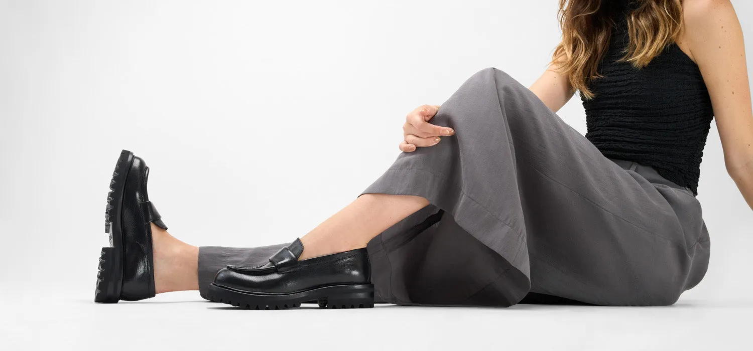 CAMDEN jet-black slip on shoes.